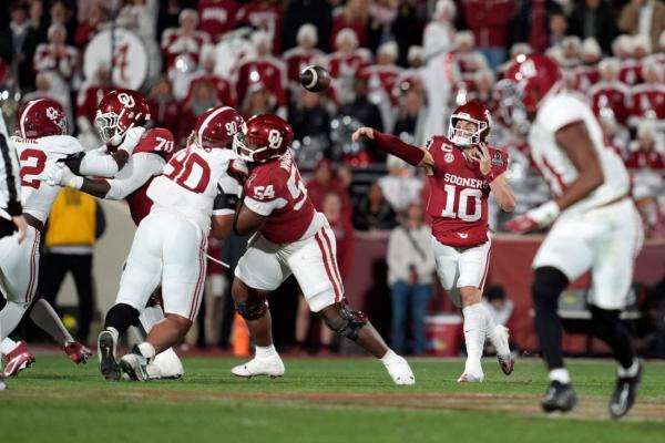 Oklahoma retains QB John Mateer, LB Kip Lewis